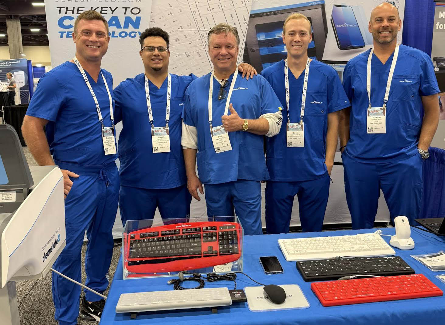 Seal Shield Team displaying CleanSlate and Seal Silk Pro mechanical keyboard at the APIC Conference