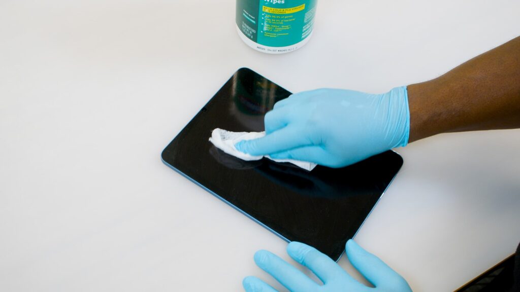Cleaning an iPad tablet using a Seal Shield screen protector 