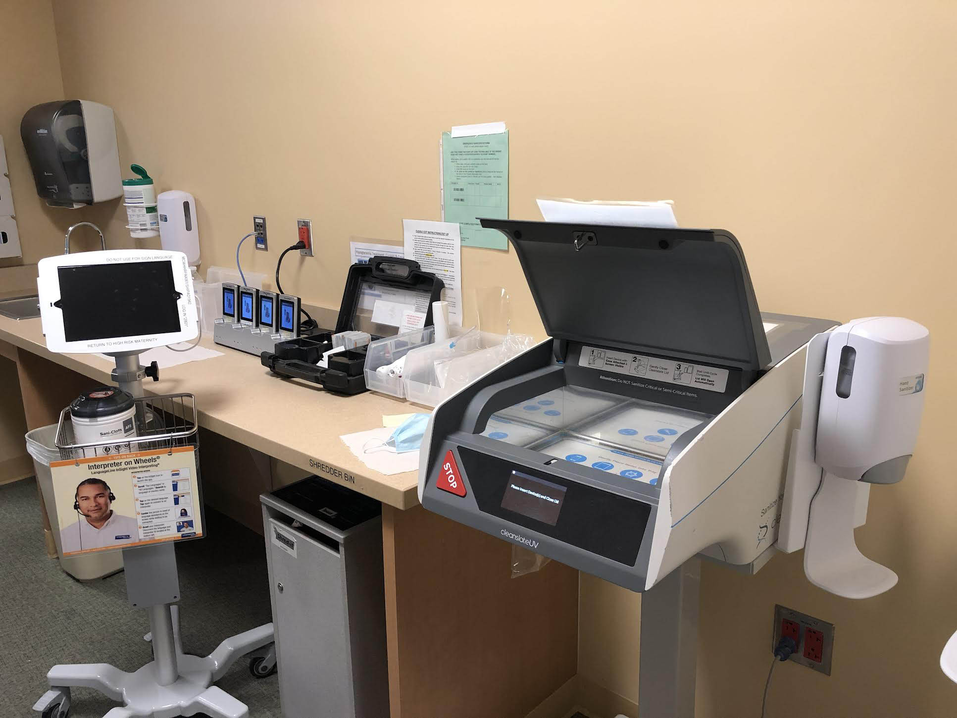CleanSlate UV sanitizer station along with disinfectant wipes