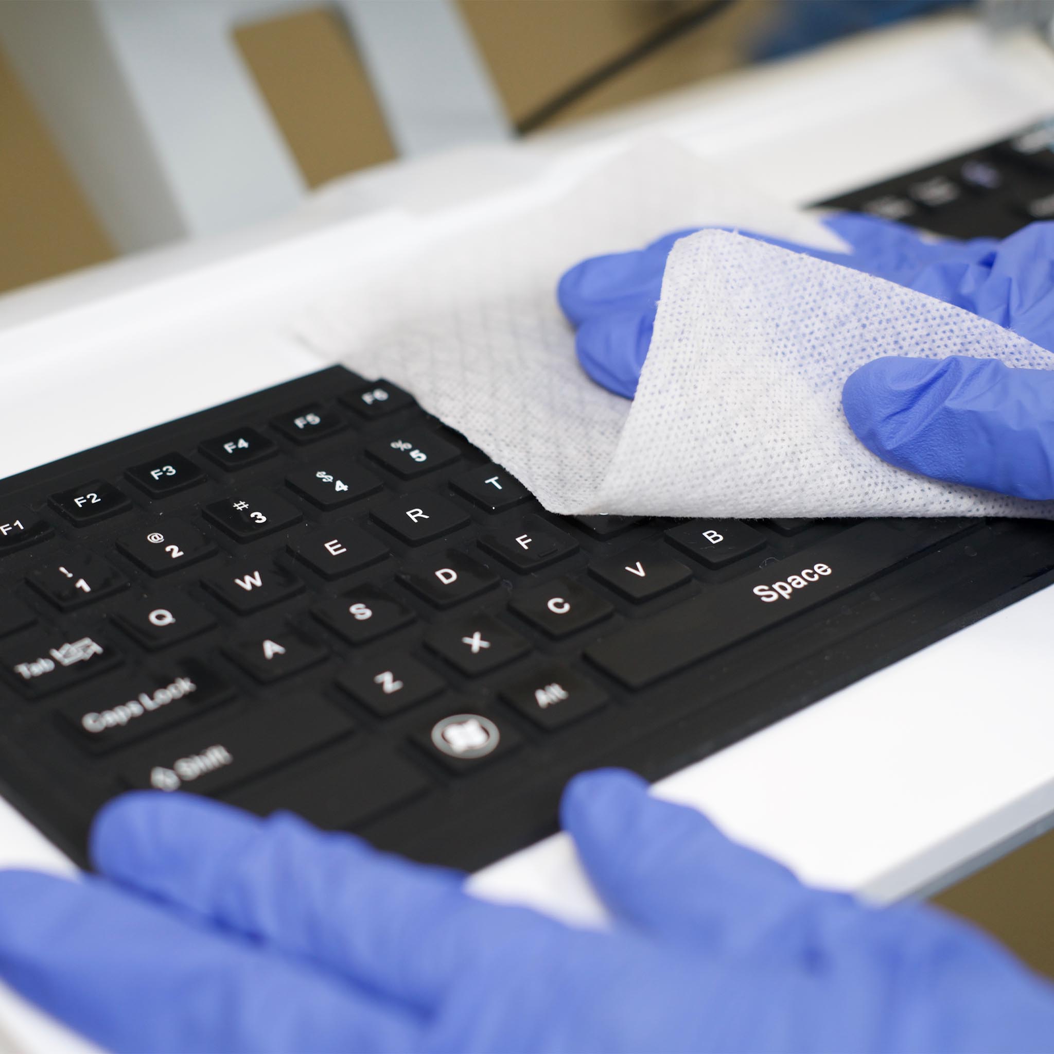 Seal Shield's 106 quiet keyboard series being cleaned by a nurse